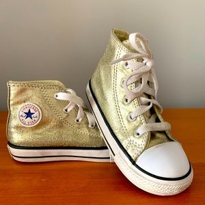 Gold converse high tops.  Toddler size 8.